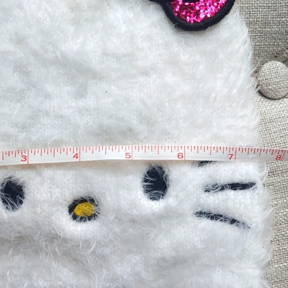 Sanrio Hello Kitty Girls White Furry Knit Beanie Hat Metallic Bow - white - 4-14